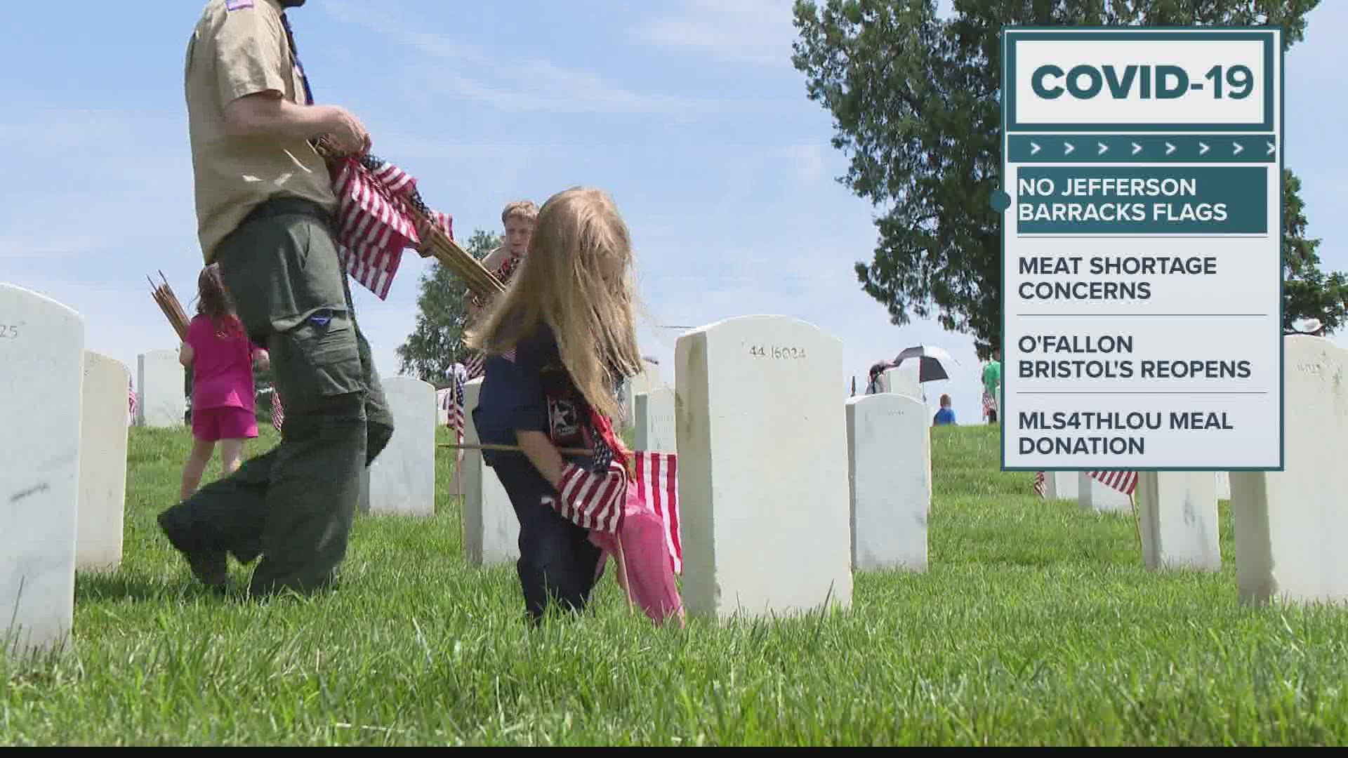 During the annual event, thousands of scouts plant American flags at the gravesites of more than 100,000 veterans