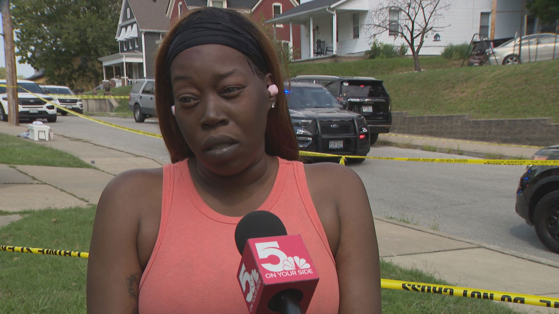 Sheniece McGruder lived next door to the home where a car crash and fire claimed two lives. Police in Belleville believe the crash was intentional.