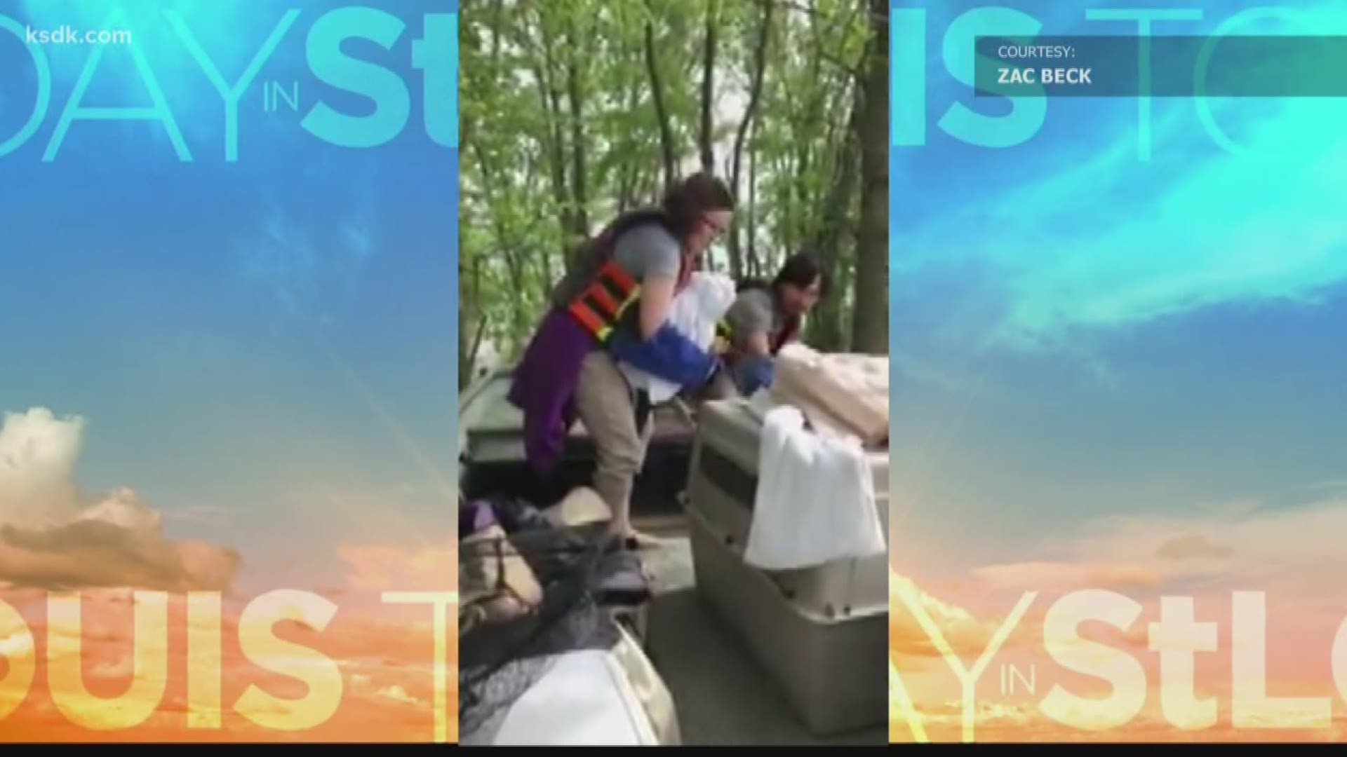 Man helps save bald eagle from flood water