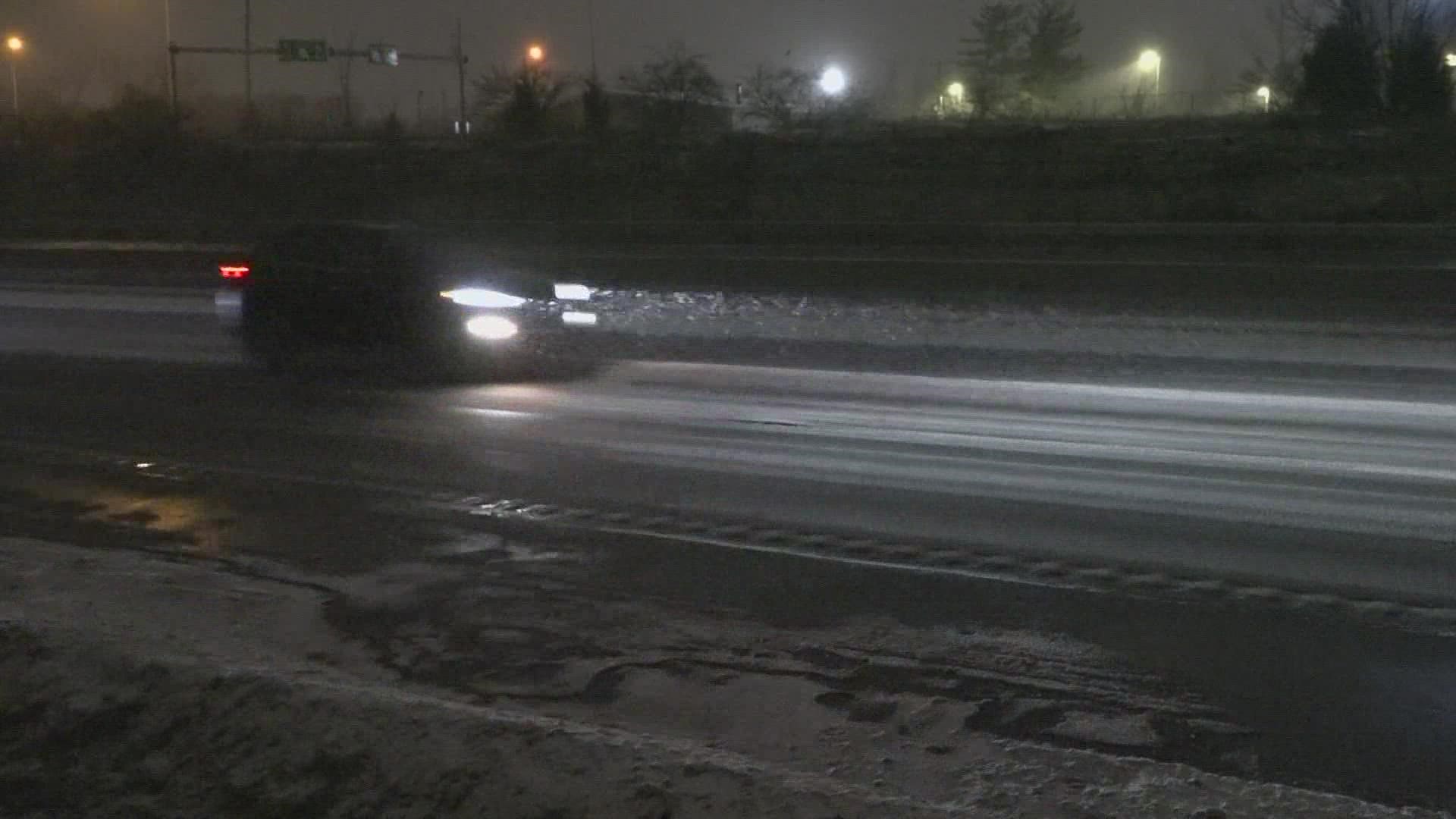 A dusting of snow fell upon wet or frozen pavement Sunday night into Monday morning.