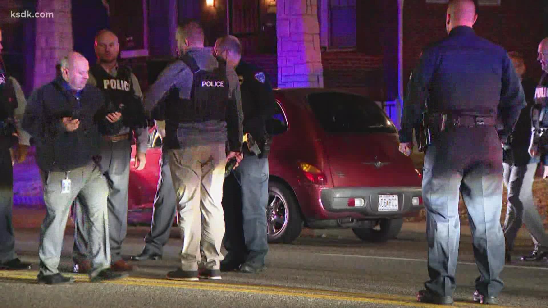Police surrounded the car on Lucas and Hunt Road near I-70 Monday night. They would not confirm if it was related to the MetroBus shooting investigation.