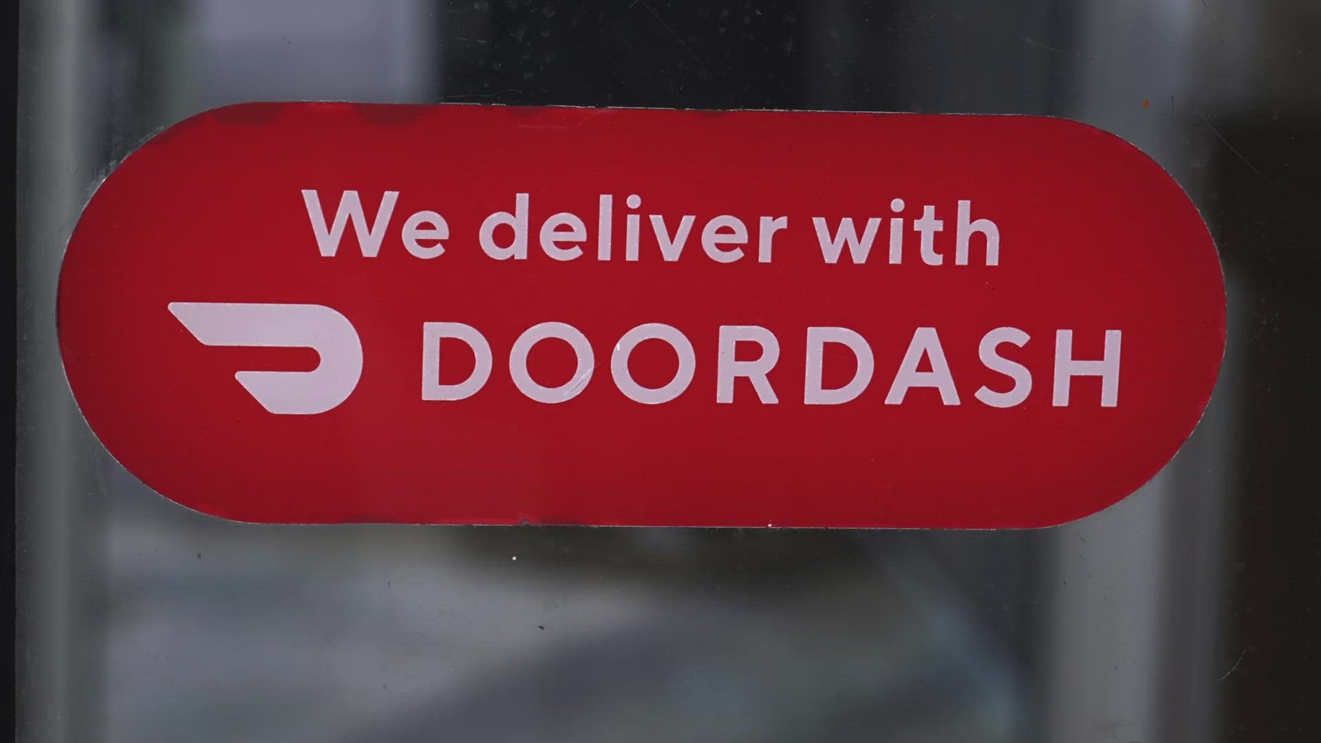A delivery driver for the online food ordering company DoorDash was arrested and charged Wednesday. Police say he barged into a customer's apartment.