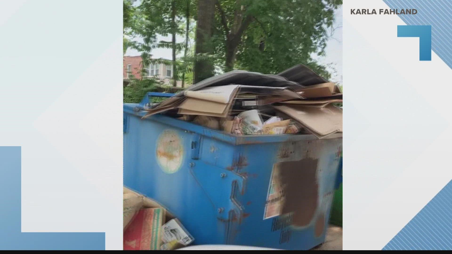 Many city trash cans were filled with weeks of garbage during the day on Friday.