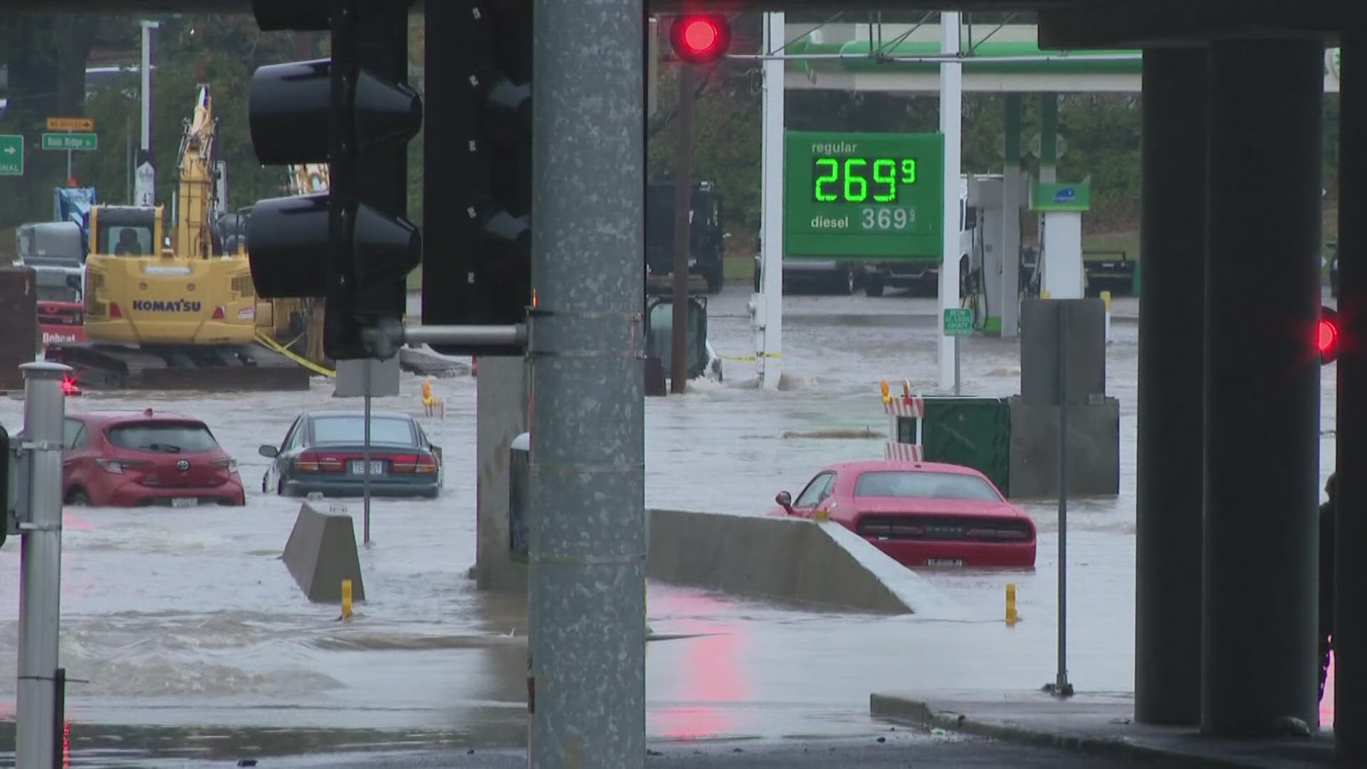 A woman was found dead inside a submerged SUV late Tuesday morning. A second person was found hours later near along Gravois Creek.