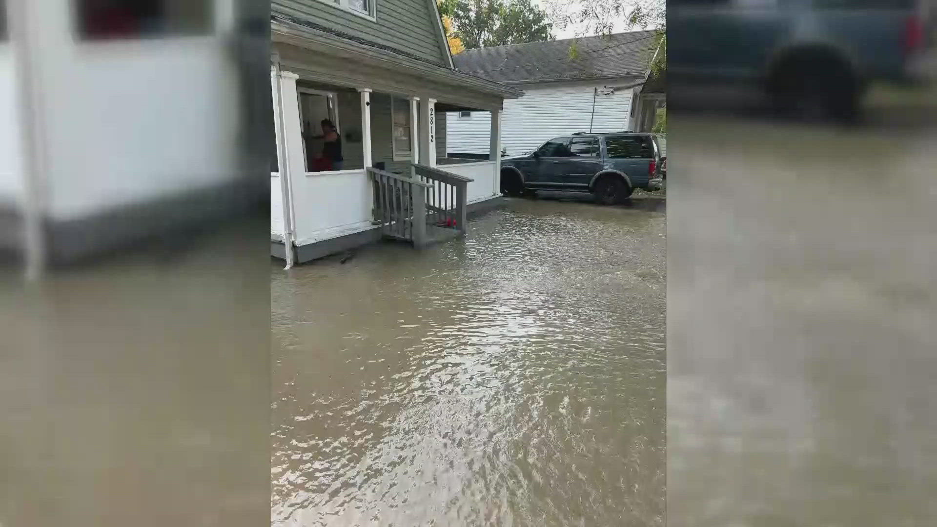 Water rushed down several residential streets, and homes were bombarded with several feet of water inside.