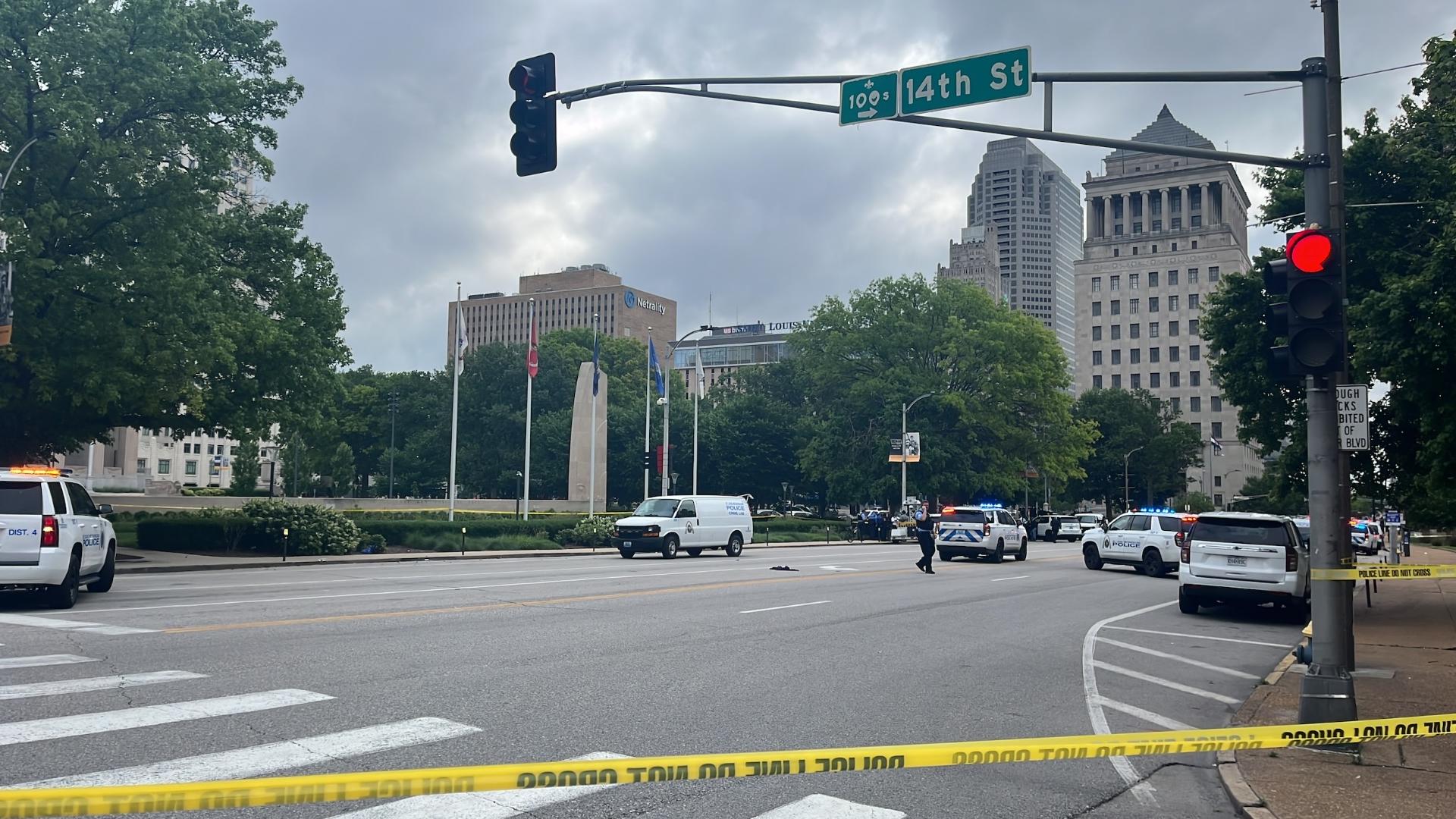 The shooting happened at about 7:30 a.m. in downtown St. Louis. Police aid the officer pulled out his gun and fired shots, striking and killing one of the men.