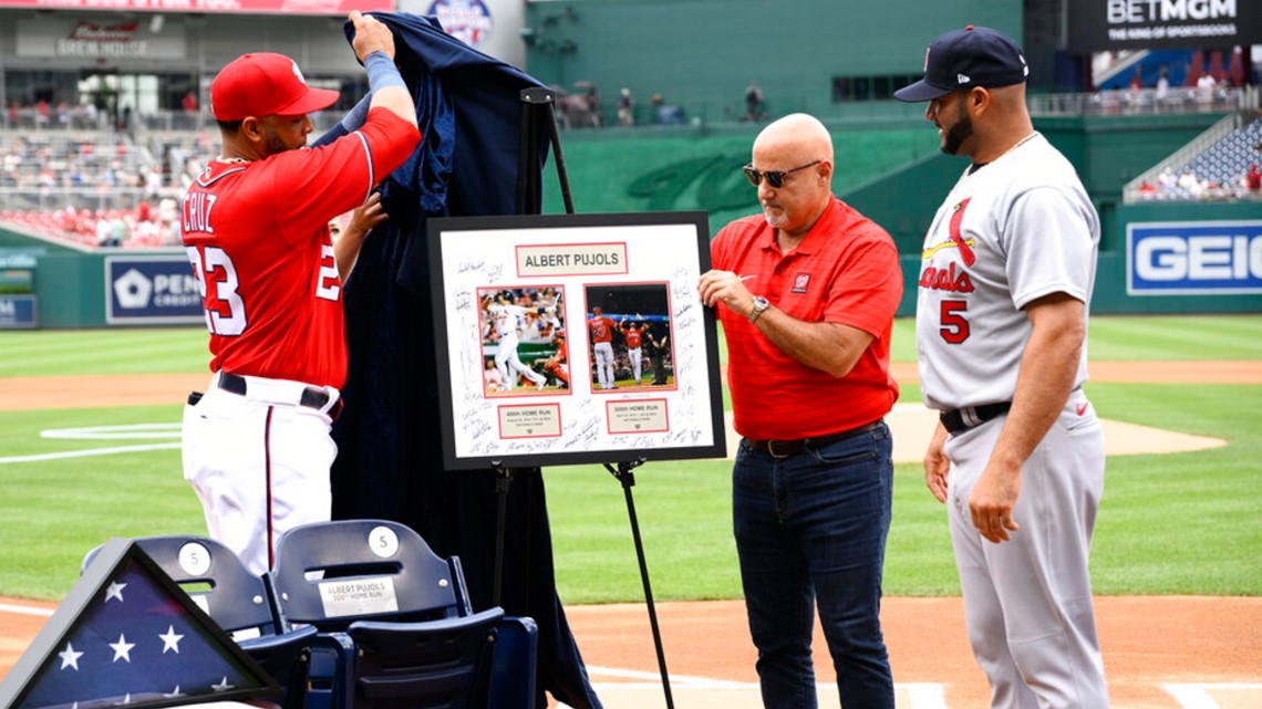 Cubs give parting gift to Pujols and Molina