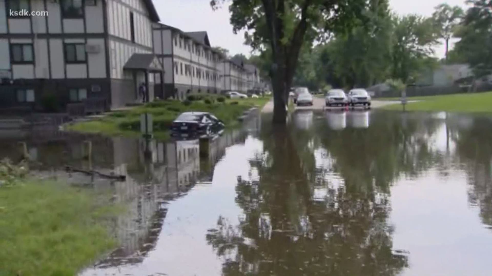 Floodwater has made its way into the parking lot at the Cedar Creek Lodge apartments forcing hundreds of people to find other places to stay.