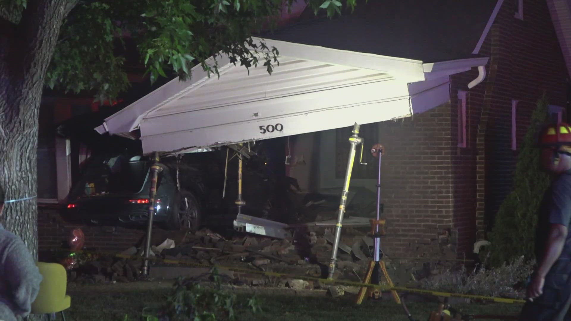 An SUV plowed into a home early Friday morning on West Drive in University City. The vehicle's driver and passenger were hospitalized.