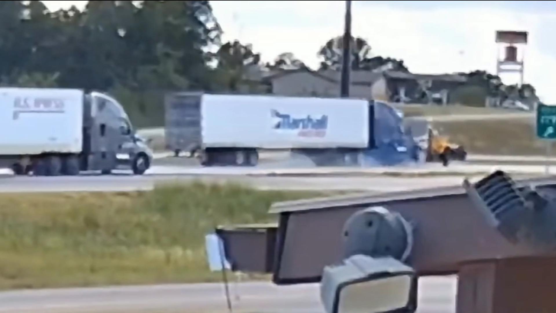 WATCH: Doolittle Rural Fire Protection District shares video of semi-truck plowing into utility truck, warning drivers to stay vigilant