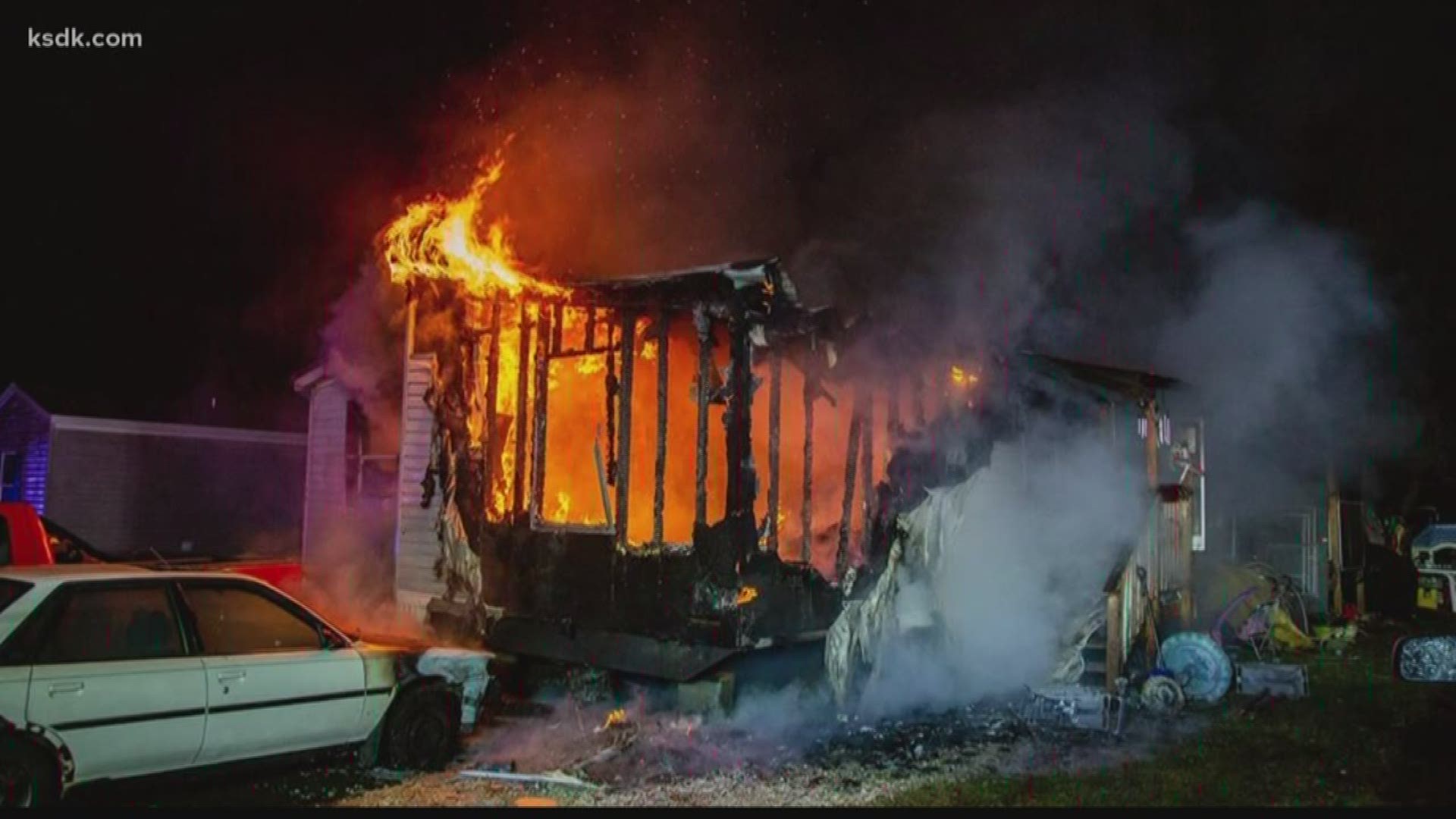The Lincoln County father tried to save his young son during a fatal fire.