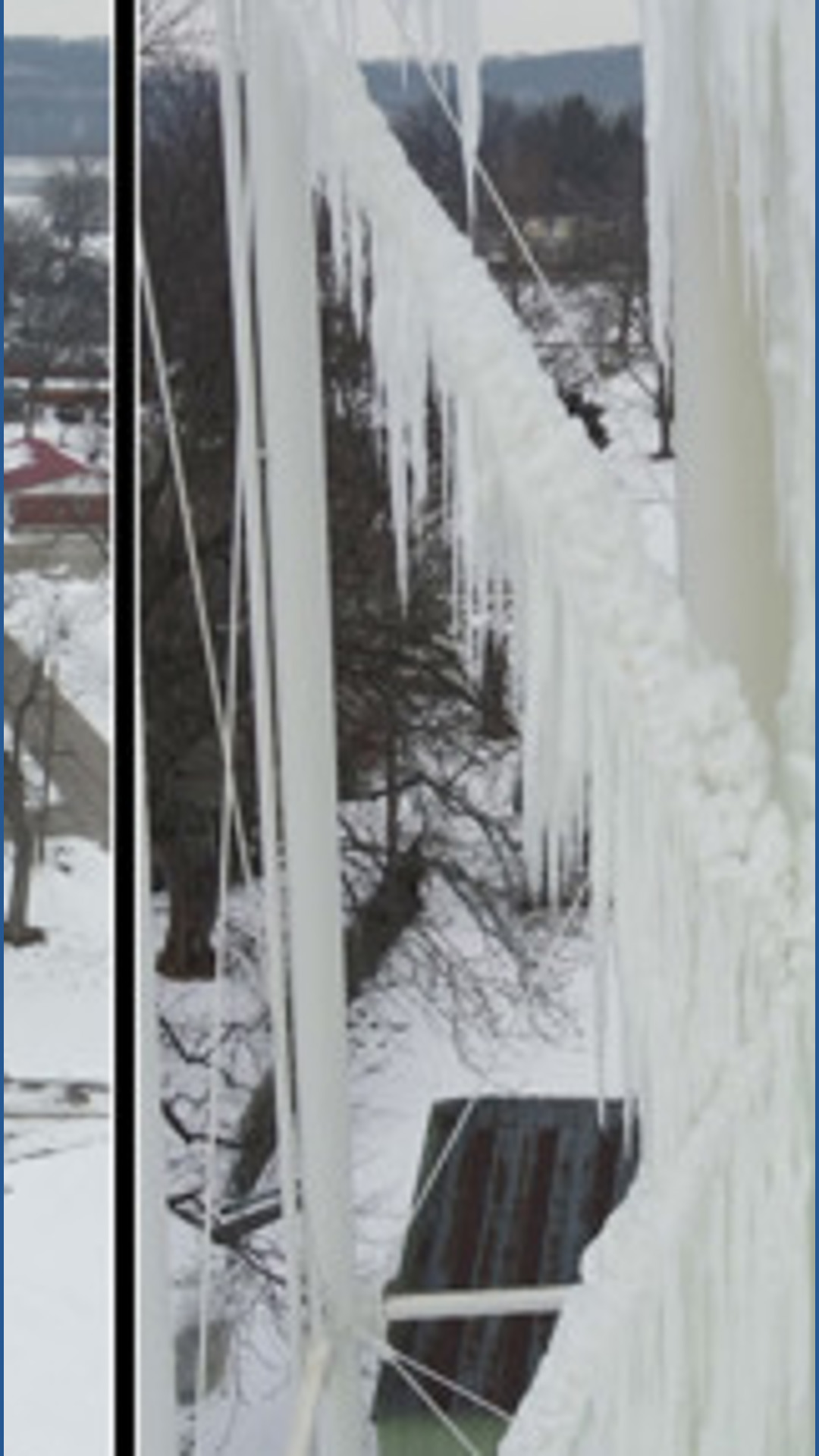 Giant icicles hang from Portage Des Sioux water tower as town waits for thaw
