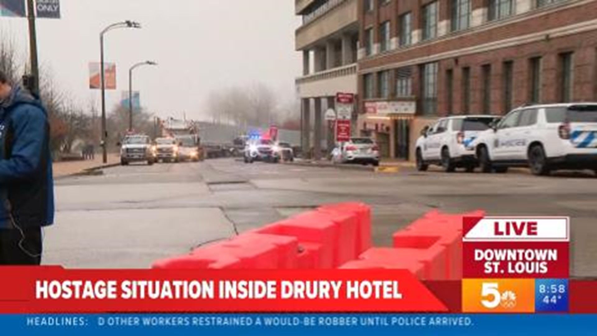 Dozens of police vehicles surrounded a downtown St. Louis hotel for a reported hostage situation Wednesday morning.