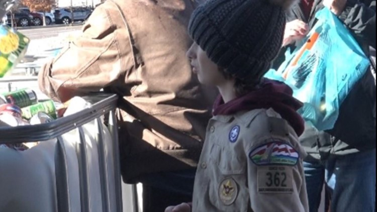 Scouts pick up Scouting for Food donations Saturday