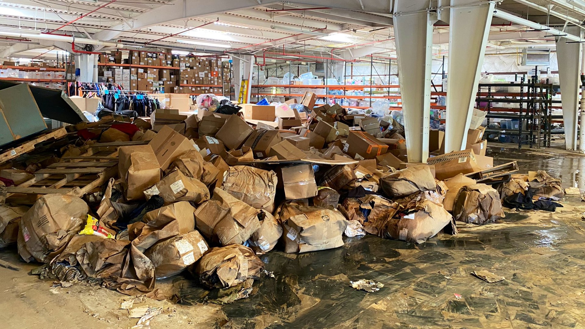 Donations turned into debris at the Little Bit Foundation in Brentwood. Three weeks later, the organization is still picking up the pieces from record rainfall.