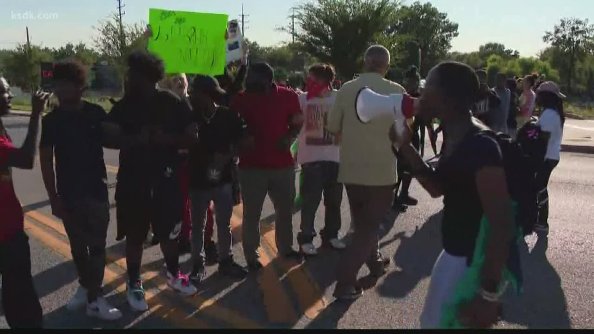 Two groups of protestors began at the Richmond Heights Police Department and marched to the St. Louis Galleria Mall.