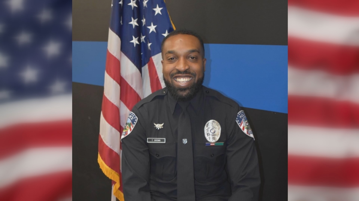 Col. Travis Brain Officer Travis Brown's family says he's still in a coma, sedation is ...