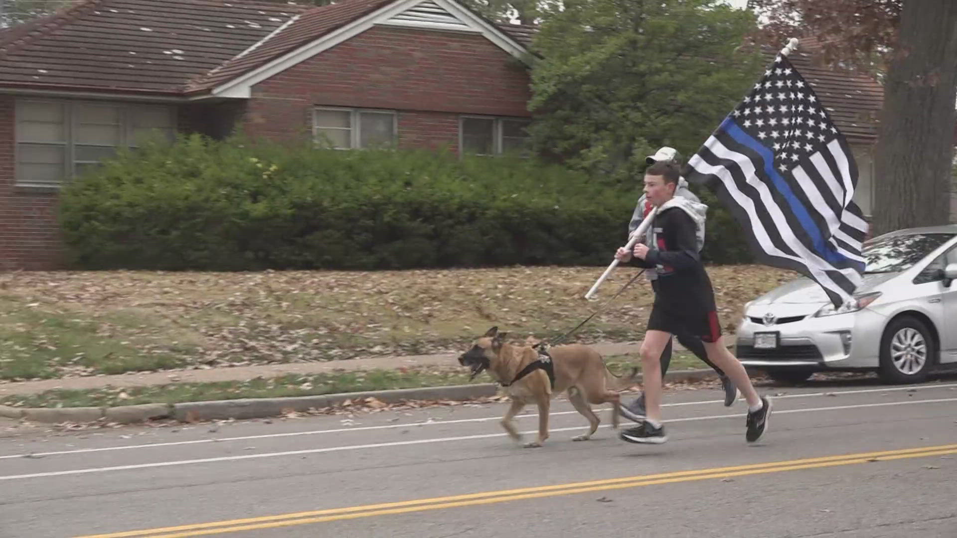 15-year-old Zachary Pruss with 'Running 4 Heroes' dedicated a one-mile run to Officer David Lee Saturday morning.