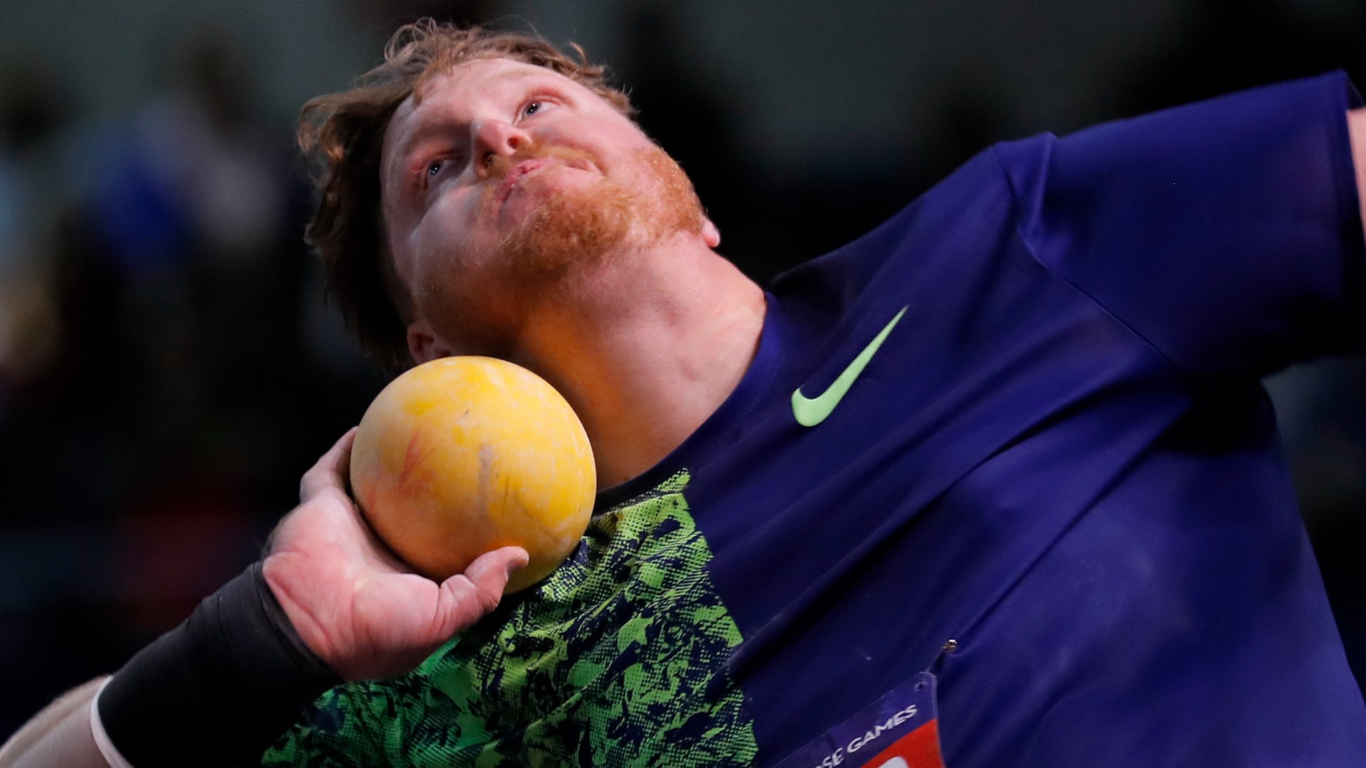 Crouser uses his large hands to throw a shot put, and to pursue tinier hobbies as well