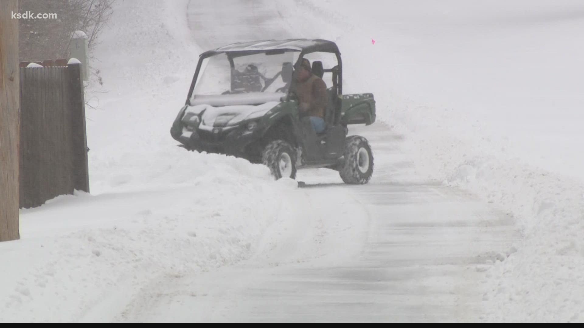 St. Louis County residents break out the toys for Thursday's big snow