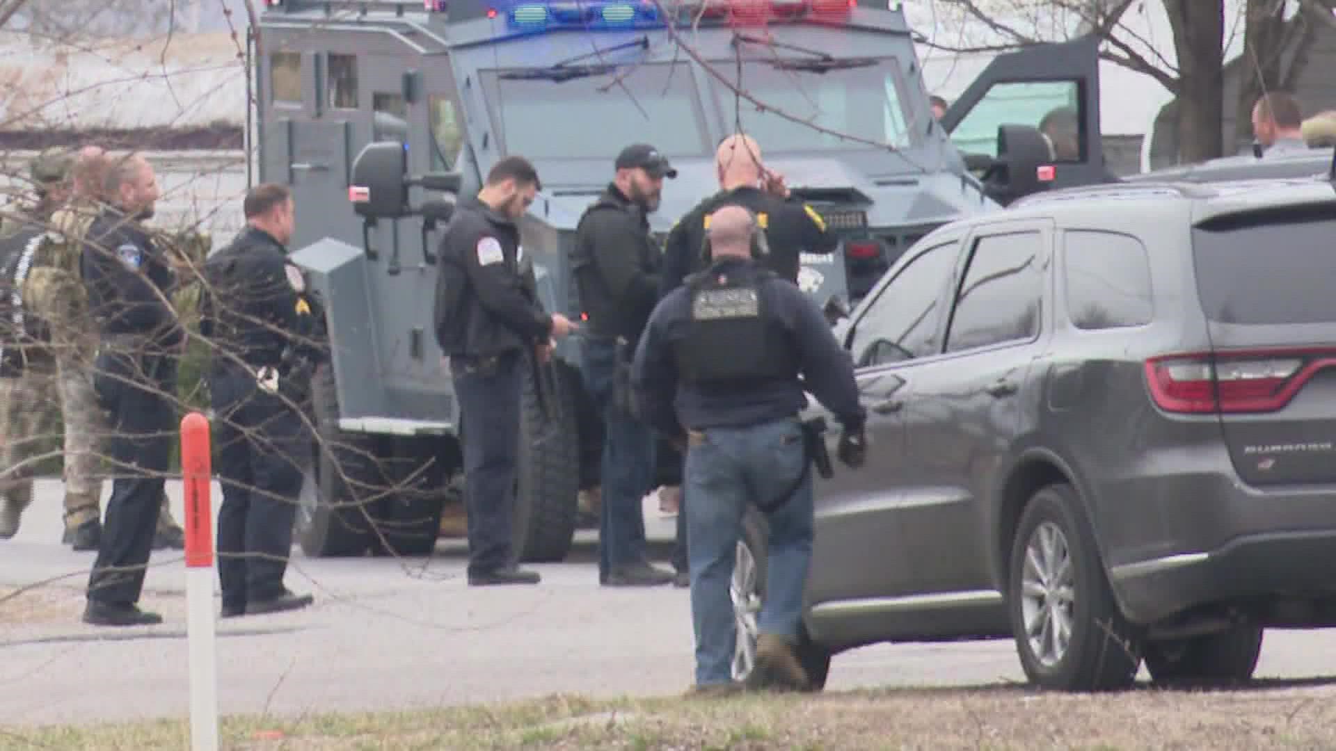 A police officer was shot in Dupo, Illinois, and the suspect has not been taken into custody, a sheriff's department spokesman said Sunday.