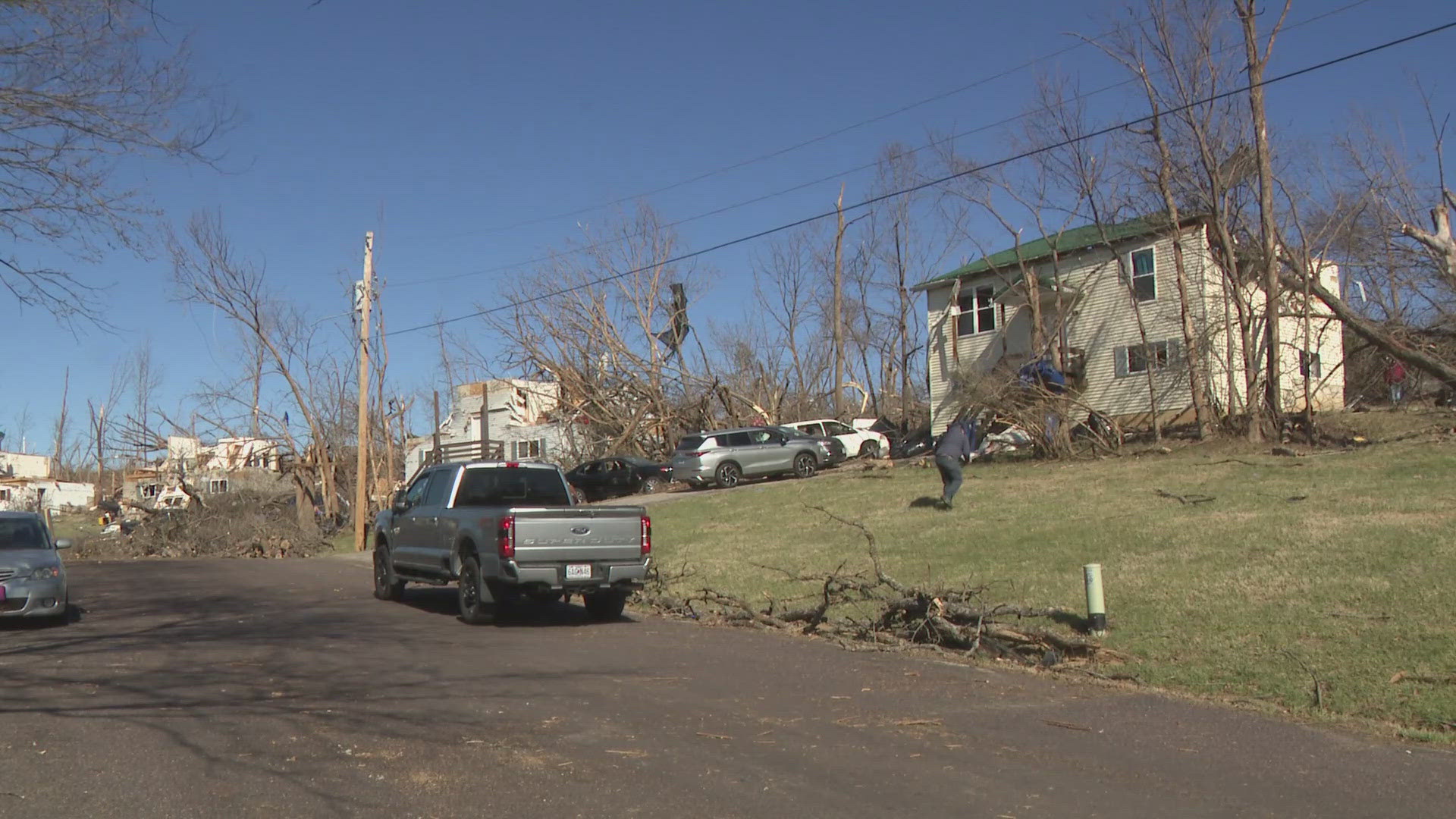 Less than 48 hours after the storm struck, several families who live on Baker Street shared their stories of survival as they assessed the damage left behind.
