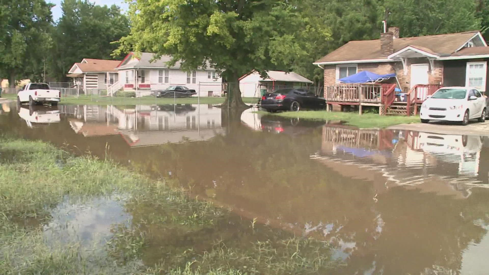 East St. Louis residents demand a response after flash floods in July. Flood victims can apply for flood damage assistance.