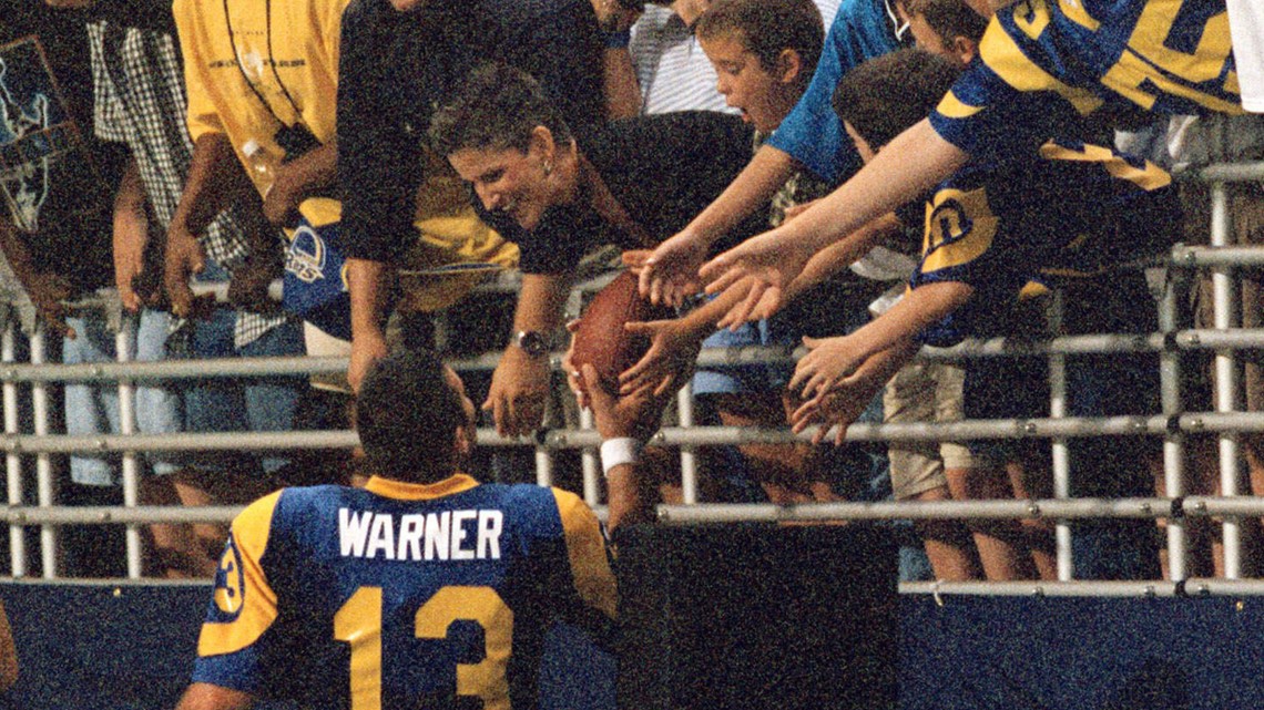 Brenda Warner, wife of Arizona Cardinals quarterback Kurt Warner, claps for  her husband after he scored a touchdown in the second quarter against the  St. Louis Rams at the Edward Jones Dome