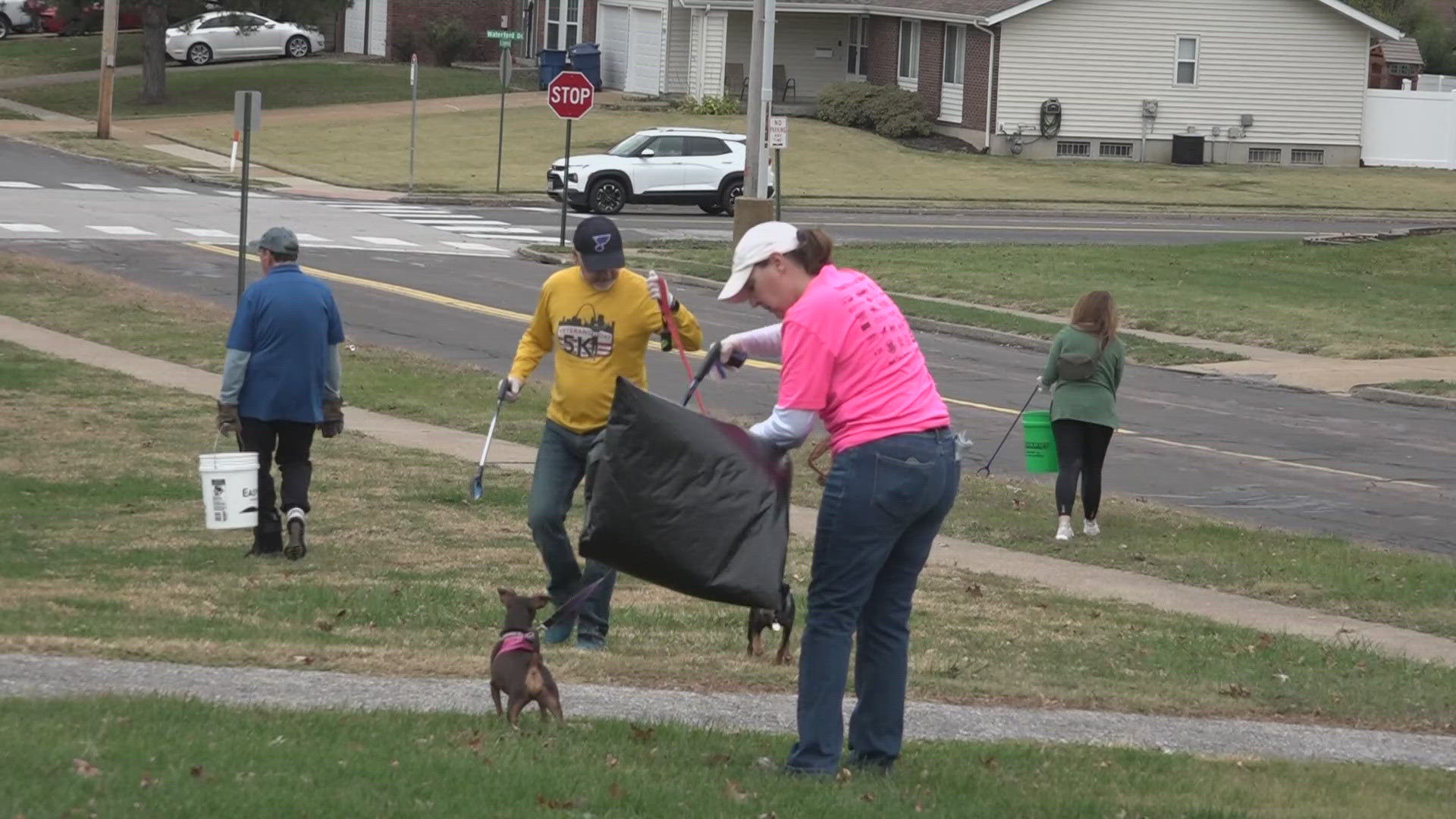 Rick Aslept and his dog, Chloe, were killed while walking in Florissant. On Sunday, the community came together to clean up the city — something Aslept did, too.