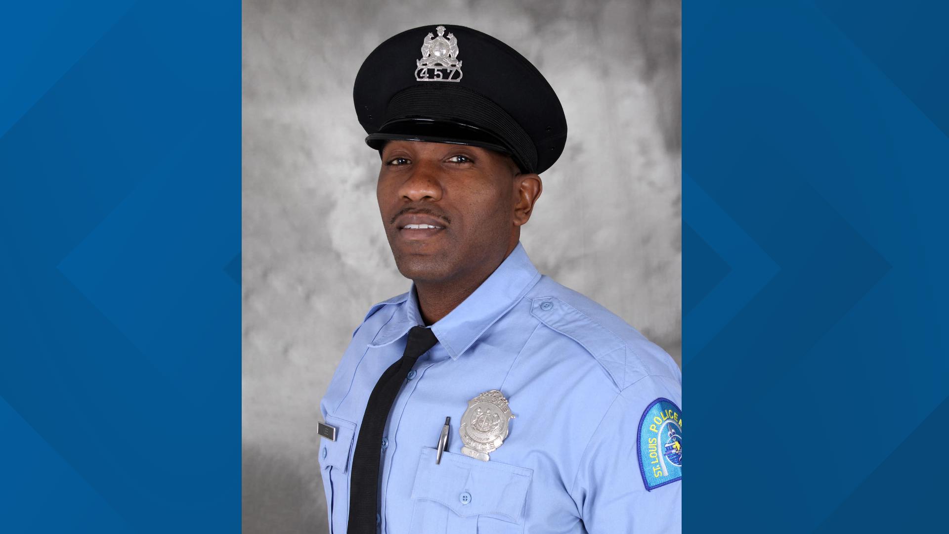 St. Louis police officers gather outside of St. Louis Police head quarters in support of Officer David Lee, who died while on the line of duty.