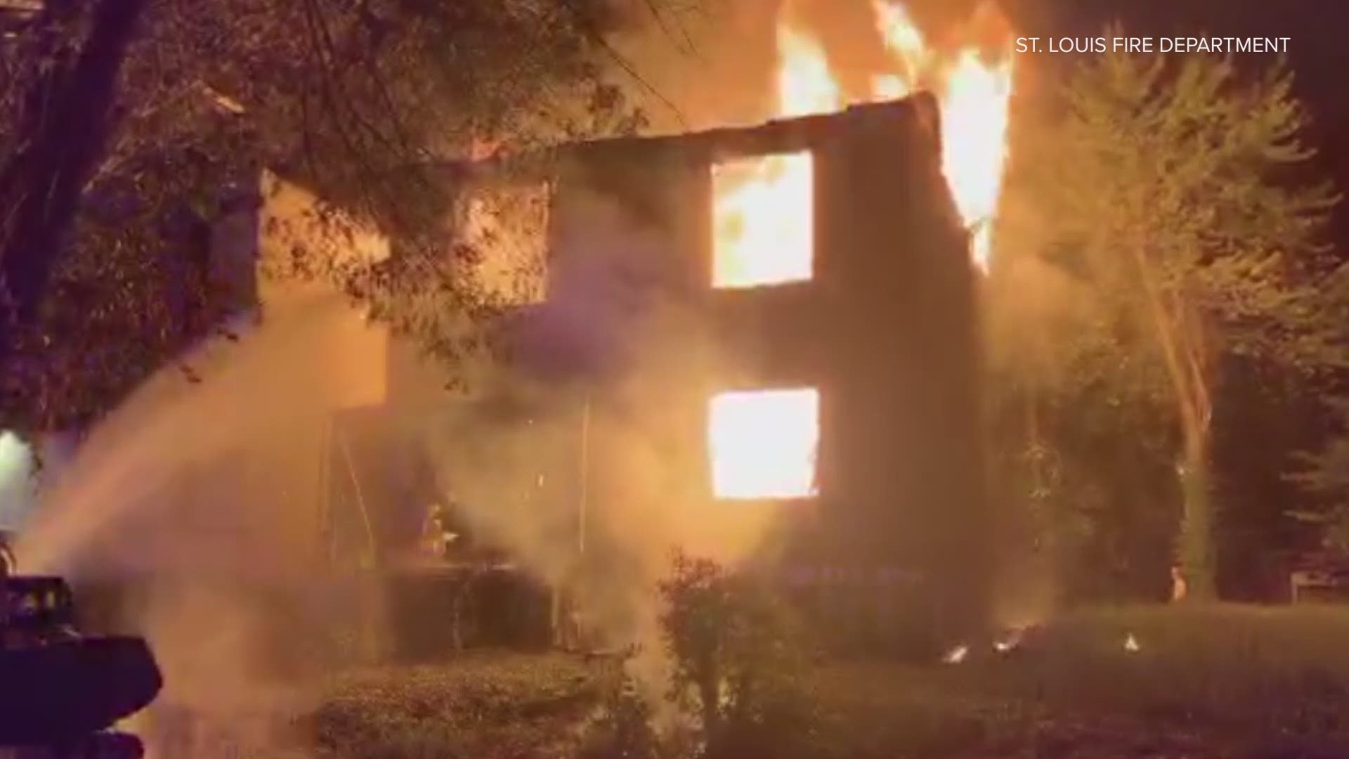 The fire department shared video showing large flames shooting out of the windows from the first floor through the roof.