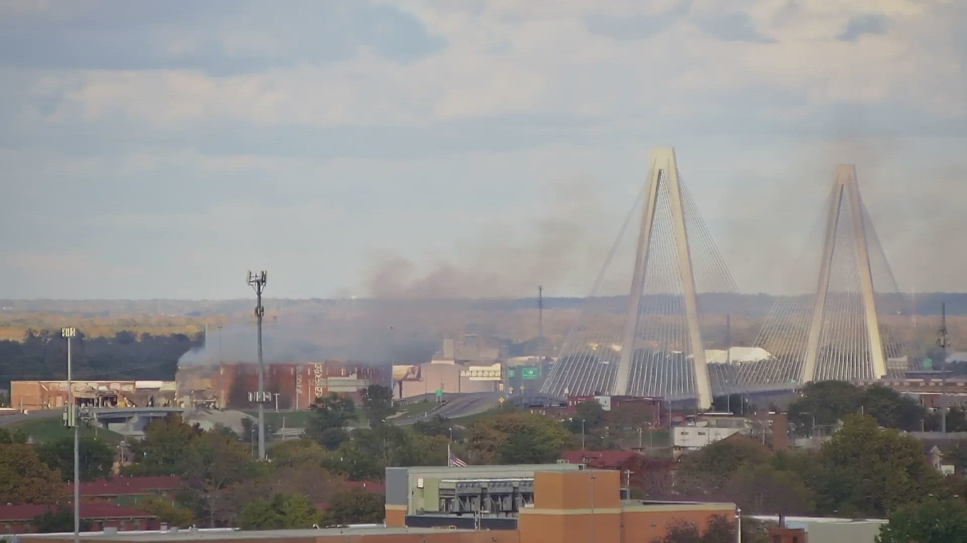 Both directions of the Stan Musial Veterans Memorial Bridge will be closed for up to two days due to a vacant warehouse fire burning nearby.