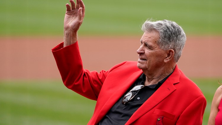 Former St. Louis Cardinals player, turned broadcaster Mike Shannon, poses  for a photograph in the radio booth before a game between the Pittsburgh  Pirates and the St. Louis Cardinals at Busch Stadium