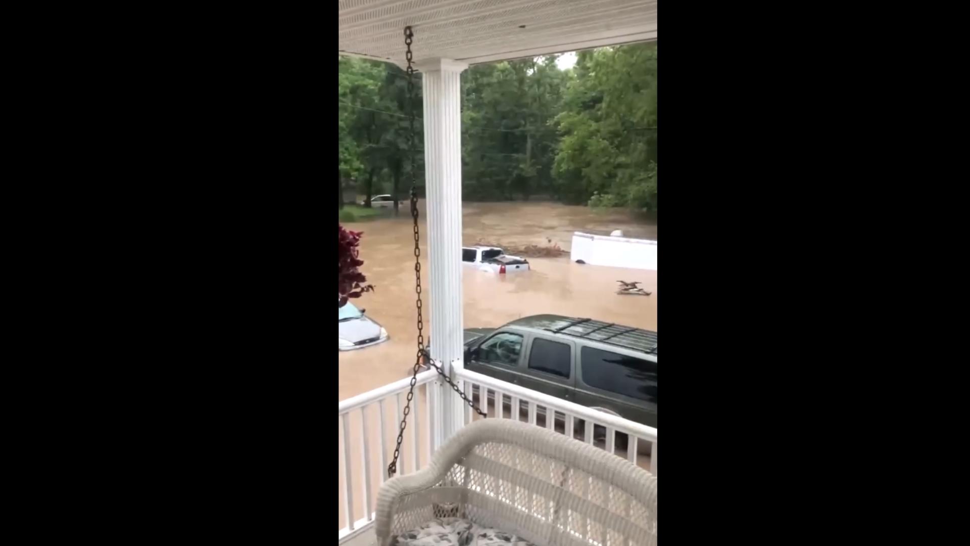 Video shows flooding in Nashville, Illinois. Homes are being evacuated and water rescues are ongoing.