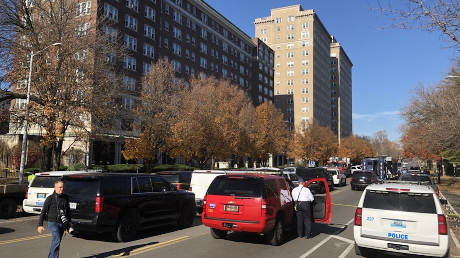 A man is dead after exchanging gunfire with police in a St. Louis apartment building. Police say he was found with two weapons.