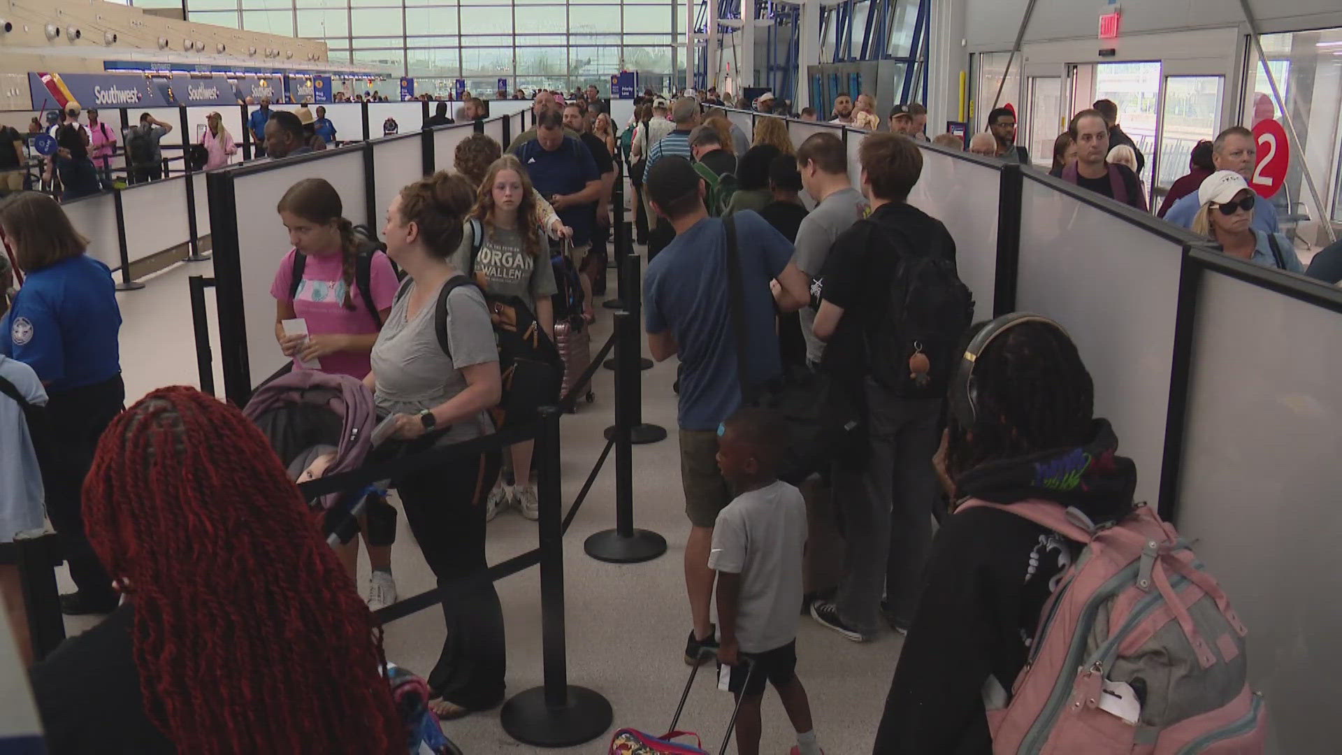 An airport spokesman said Sunday was one of the busiest days of the year due to a huge convention that ended Saturday.