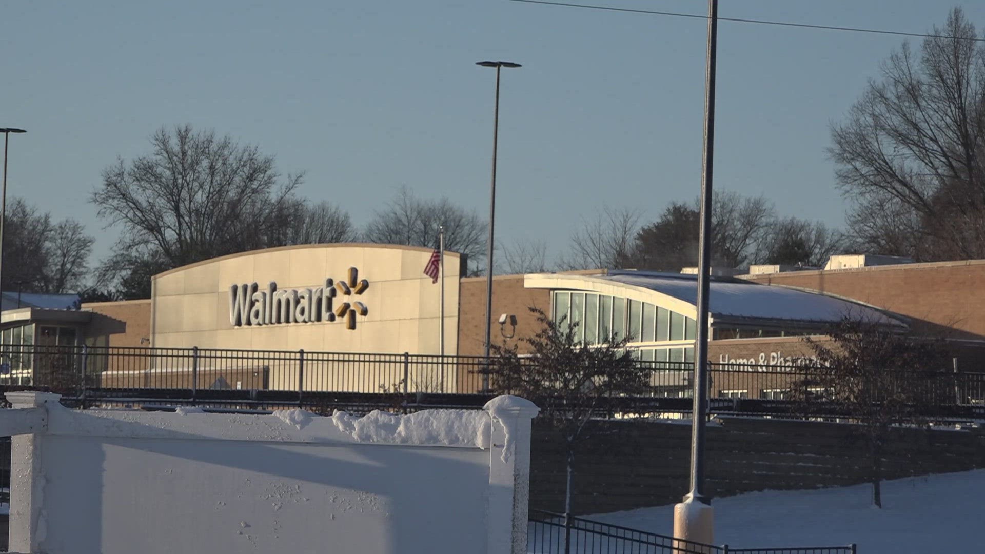 Police said a Walmart employee who shot the victim was taken into custody.