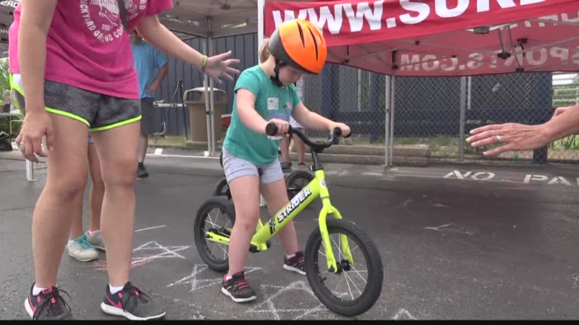 Children with Down syndrome get free bikes, learn to ride at Festus
