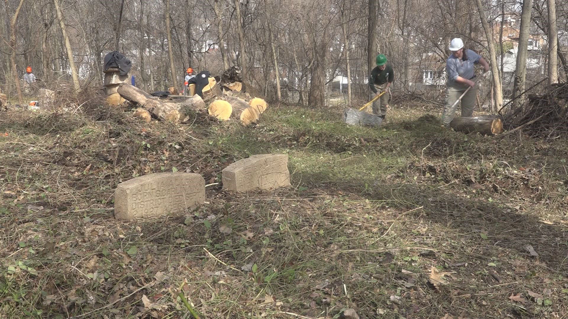 Cleanup continues at the historic Greenwood Cemetery in north St. Louis County. Flooding once again delayed conservation efforts.