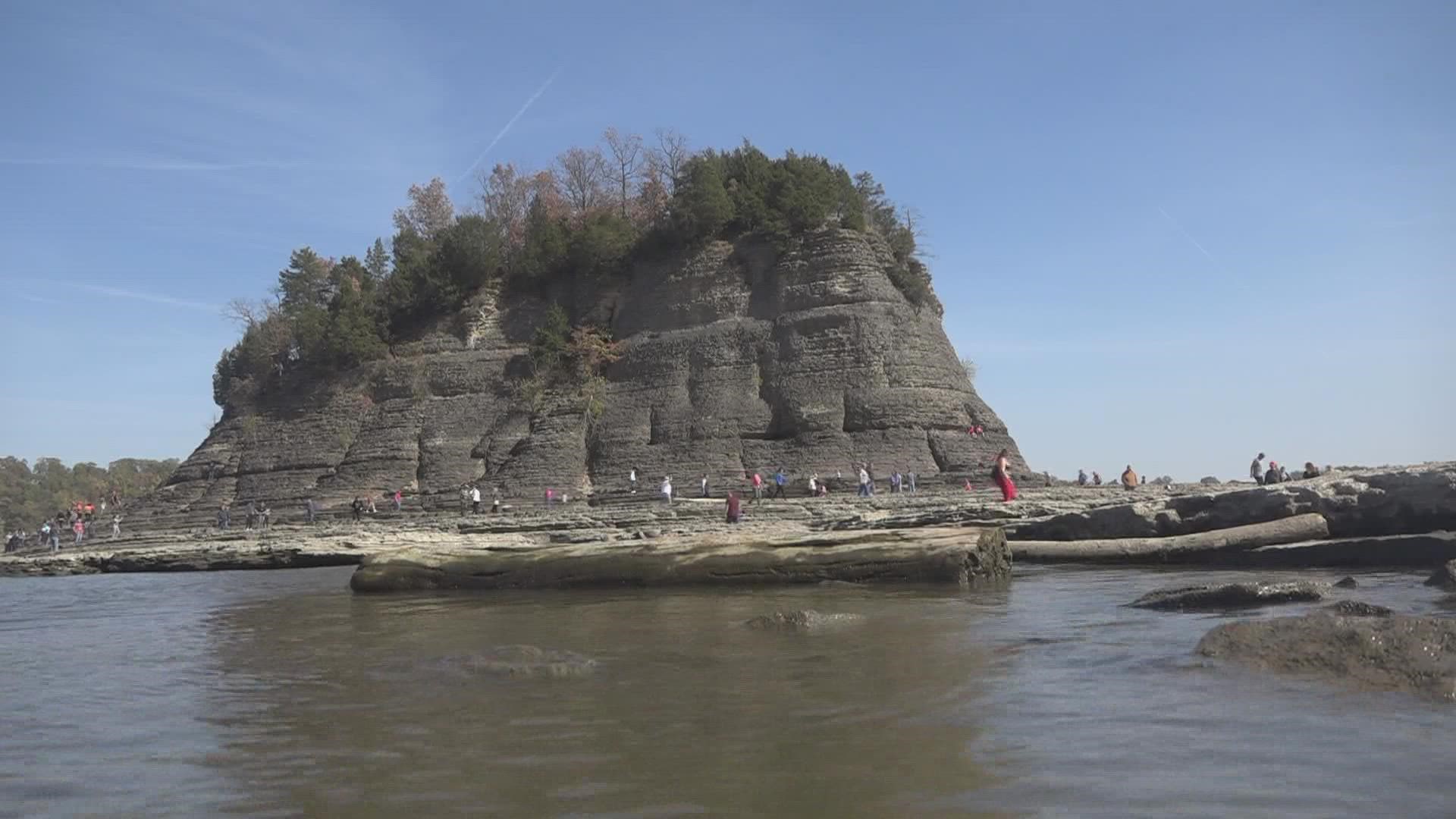 Tower Rock has turned into a tourist destination following drought-like conditions. The low water levels have created a land bridge to the rock.