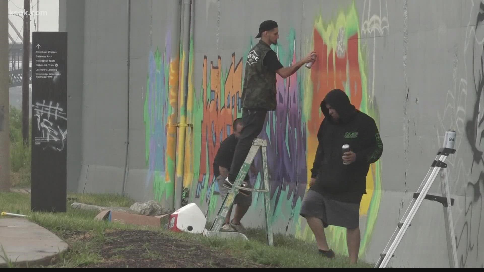 Graffiti artists and muralists from around the world are creating works of art that will bring the community together.