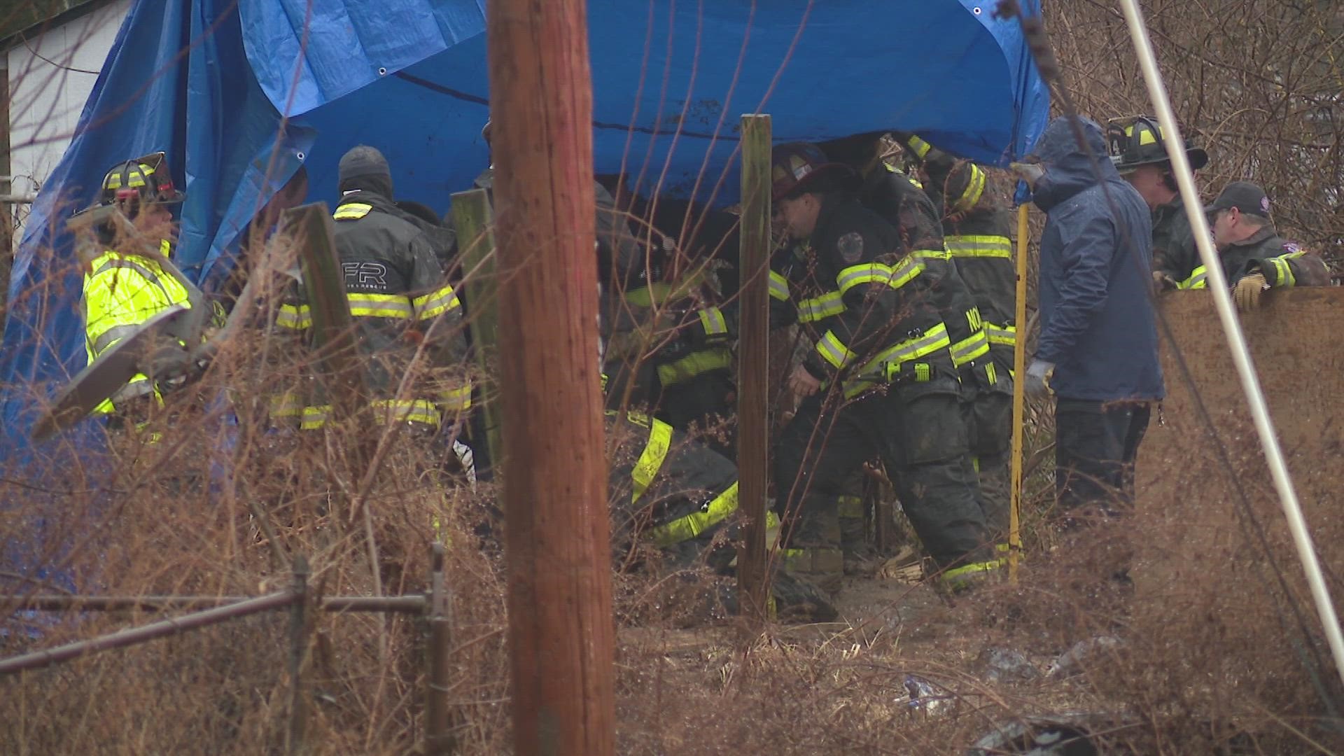 The man was walking to work when he became trapped in the mud pit. He is expected to be ok, but he was trapped for hours.