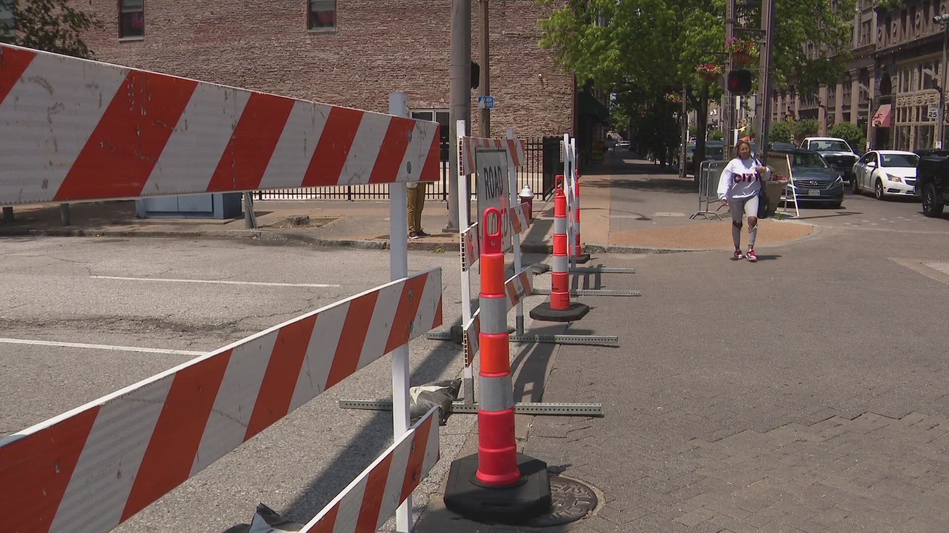 Businesses on Washington Avenue in St. Louis struggling with new summer security measures. While street barriers help control crime, it's bad for business.
