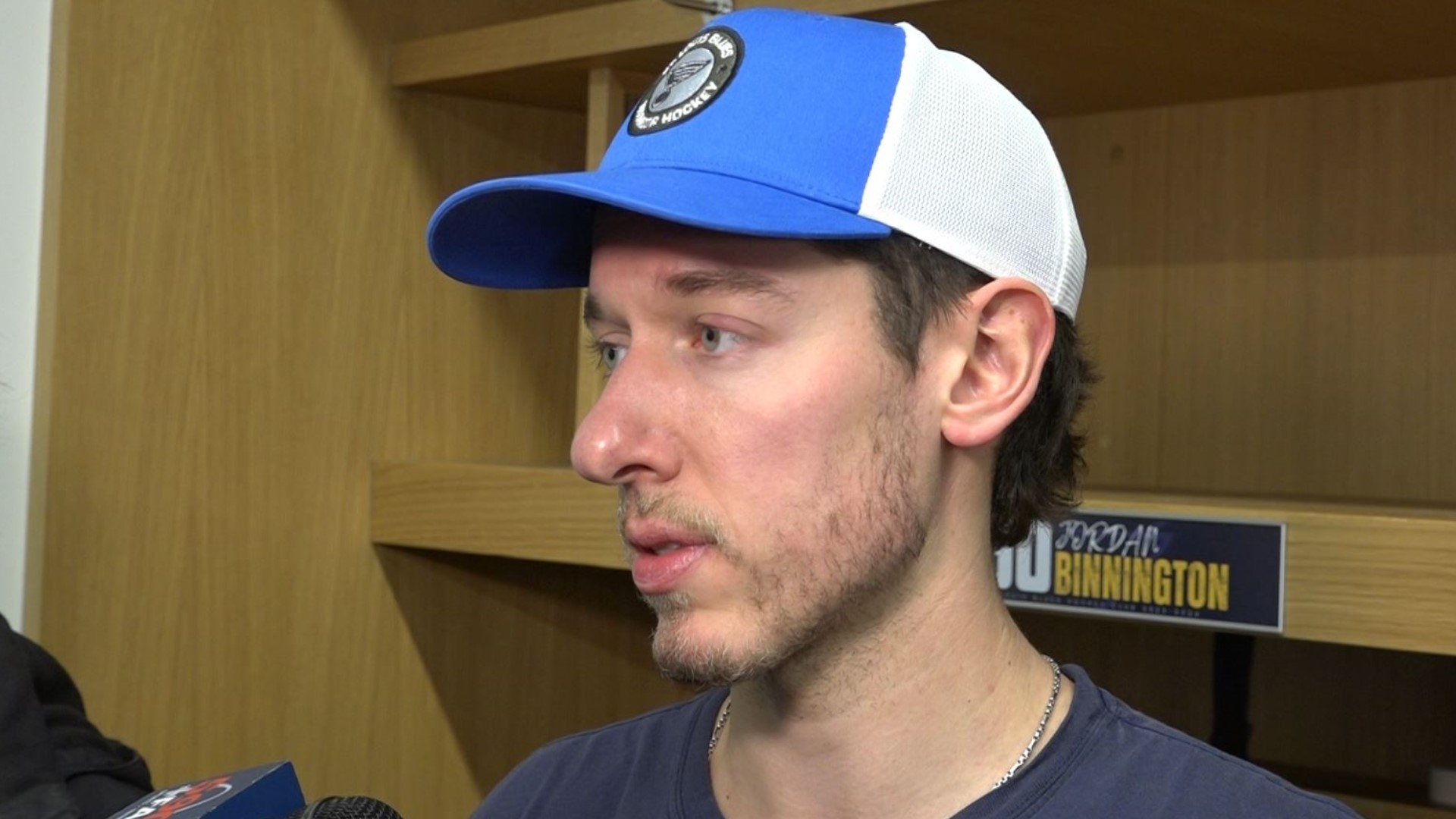 Jordan Binnington reacts to the St. Louis Blues firing its head coach Craig Berube. Drew Bannister was named interim coach.