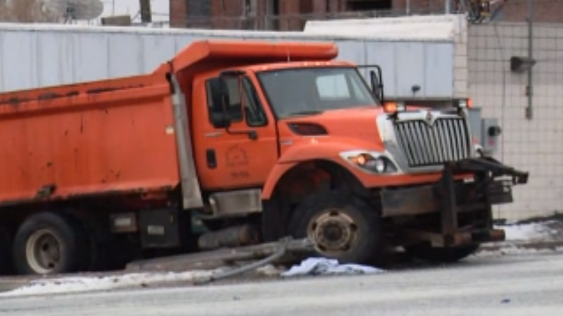 The truck was not salting the road when it spun out. It hit some barriers in front of a supermarket.