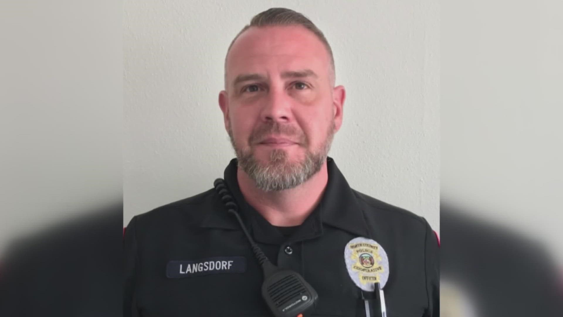 Officer Michael Langsdorf was killed in 2018 while responding to a report about a bad check at Wellston Market.