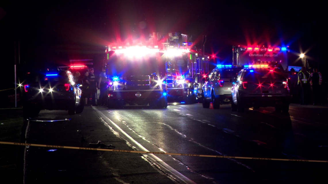 Car hits St. Louis County police officer dispersing crowds