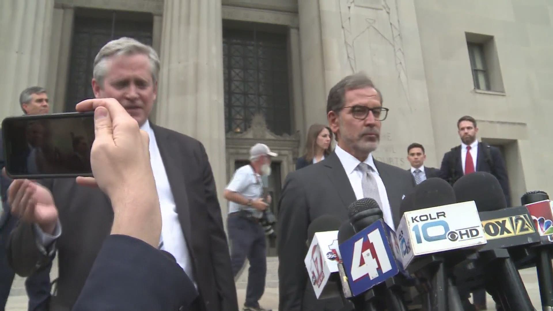 Lawyers James F. Bennett(Left), Scott Rosenblum(Center) and Edward Dowd Jr.(Right) calk about the case after the case against Gov. Greitens was dismissed.