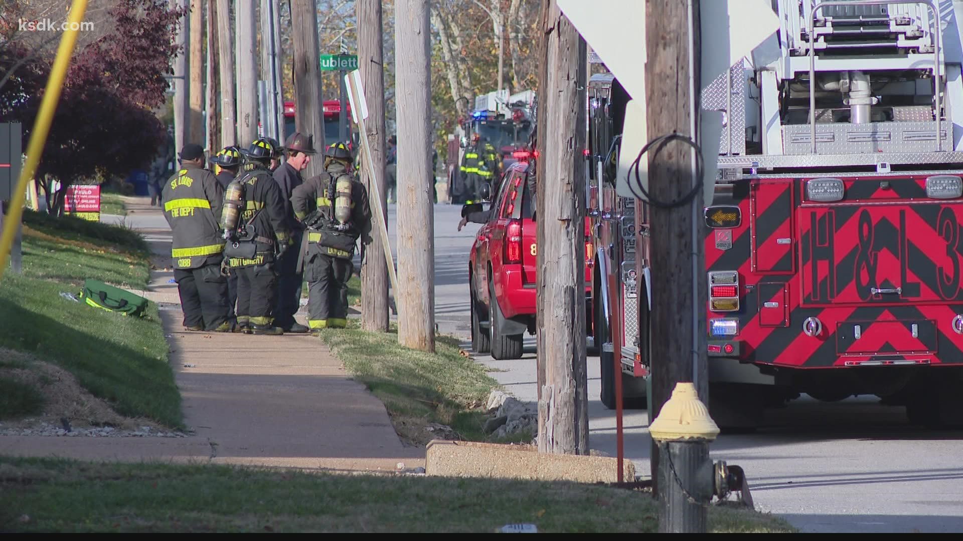 Two people were taken to a hospital with chemical burns after a hazmat situation in St. Louis Tuesday morning.