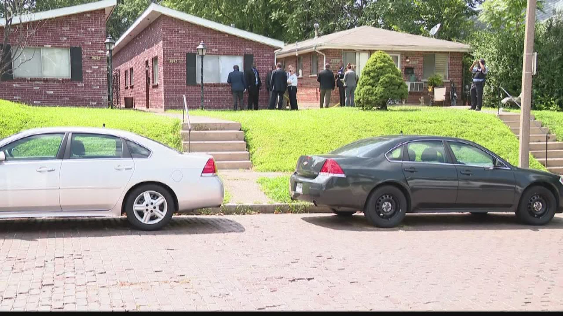 South St Louis residents are waiting for answers after two of their neighbors were found murdered in a quiet block today.